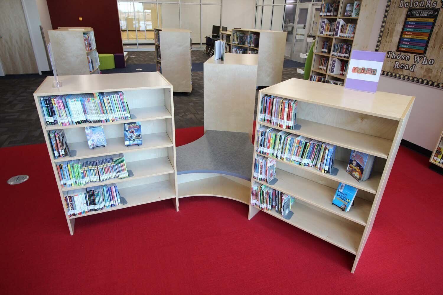 Curved fiction shelving units