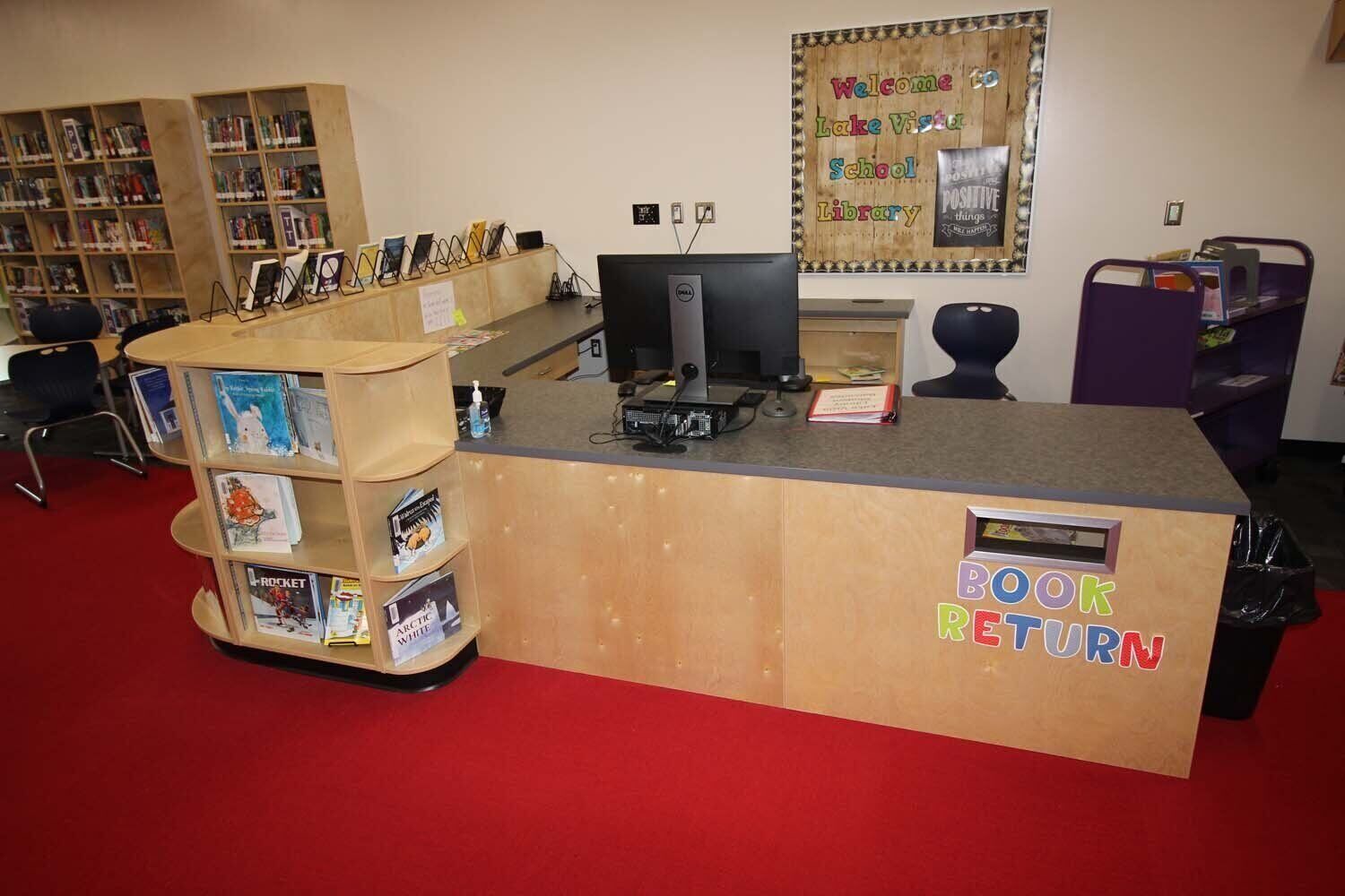 Librarian circulation desk with storage