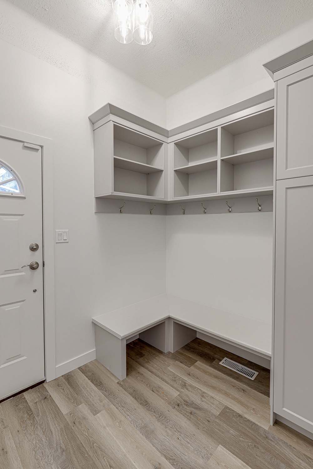 Reach-in closet interior with adjustable shelving