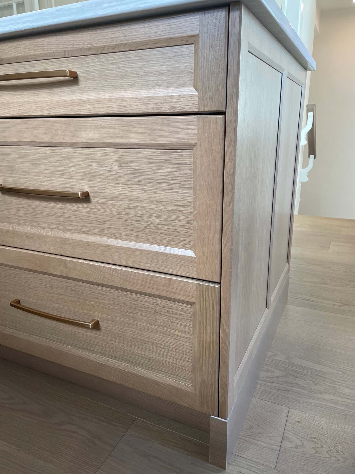 Brass pulls on wood drawer fronts