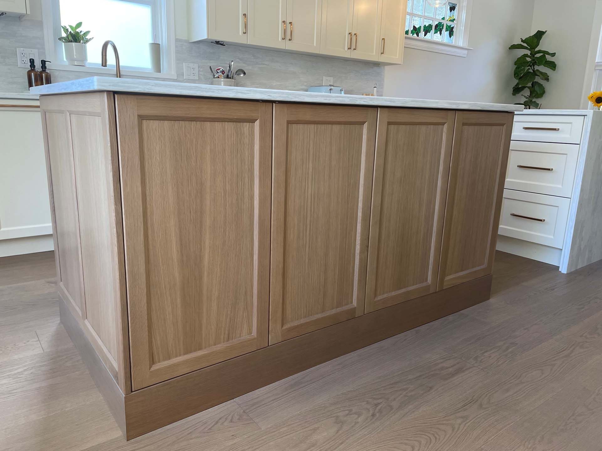 Wood kitchen island with shaker panels