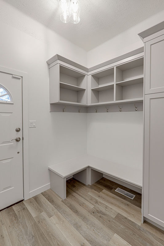 Custom walk-in closet with hanging, shelving and drawers