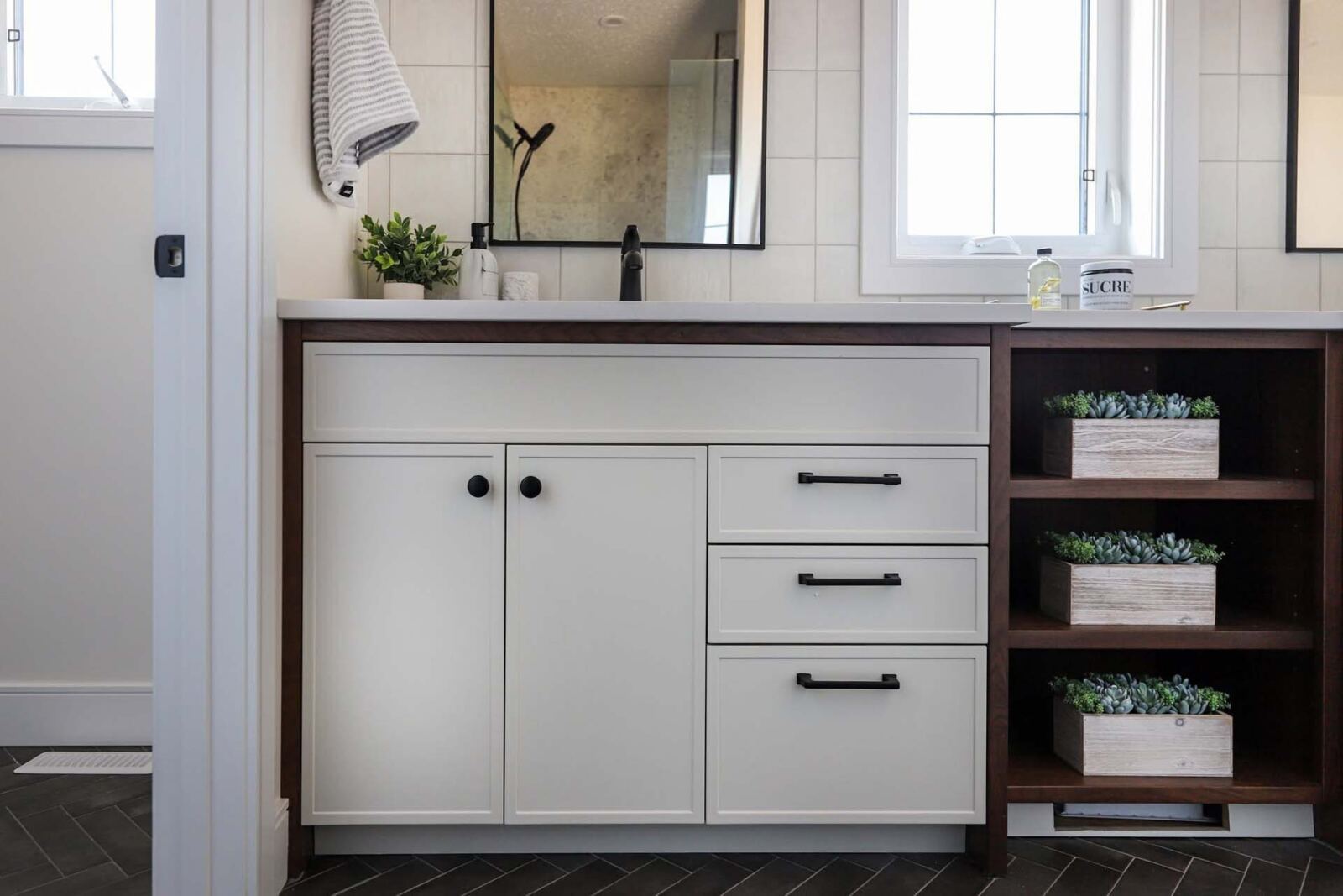 Vanity with undermount sink and matte black fixtures
